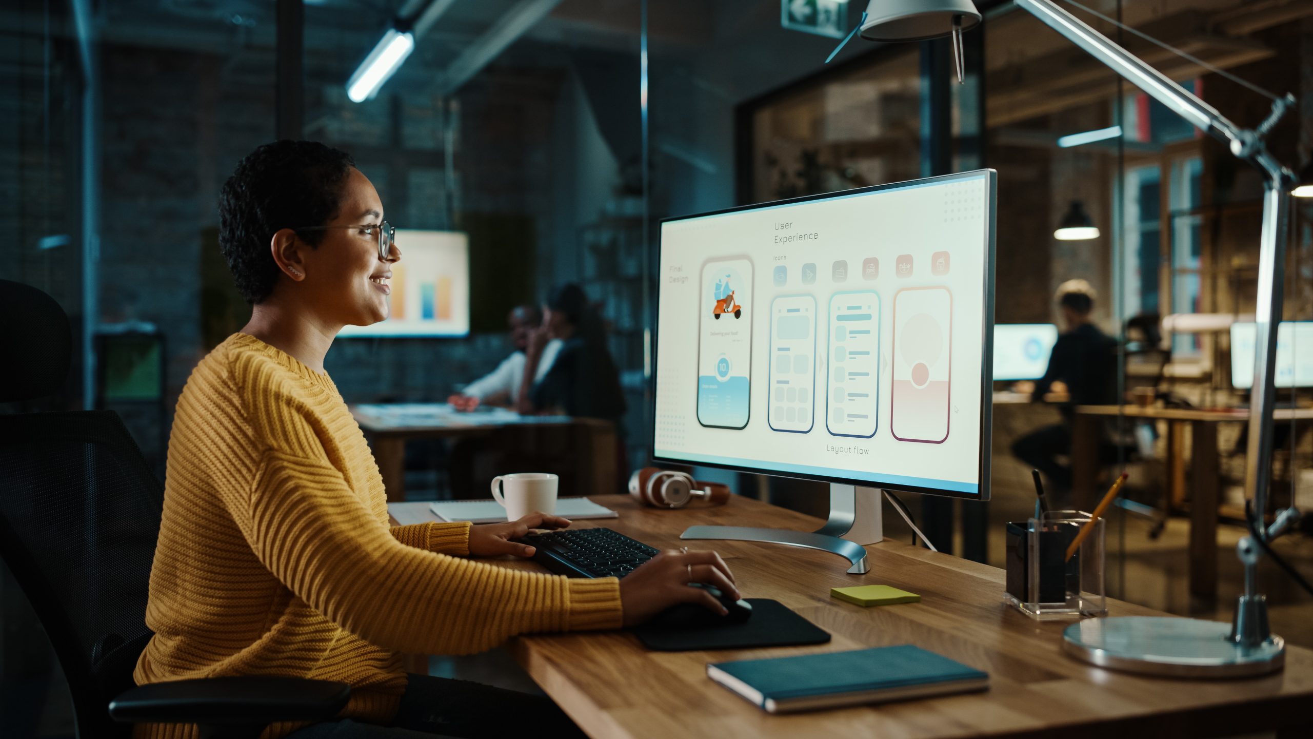 Young,Latina,Designer,Working,On,A,Desktop,Computer,In,Creative